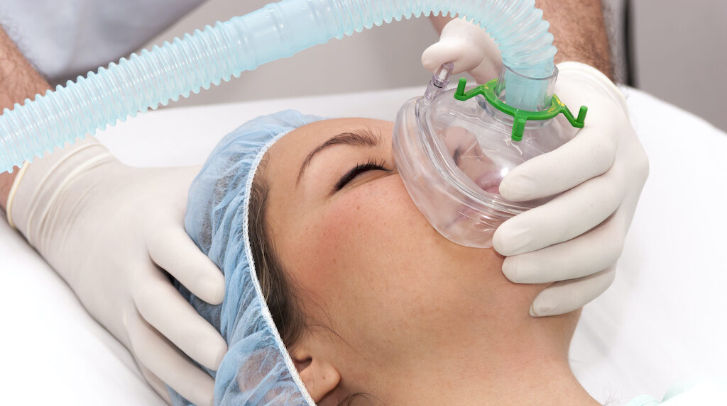 Woman gettin anesthesia for her oral procedure