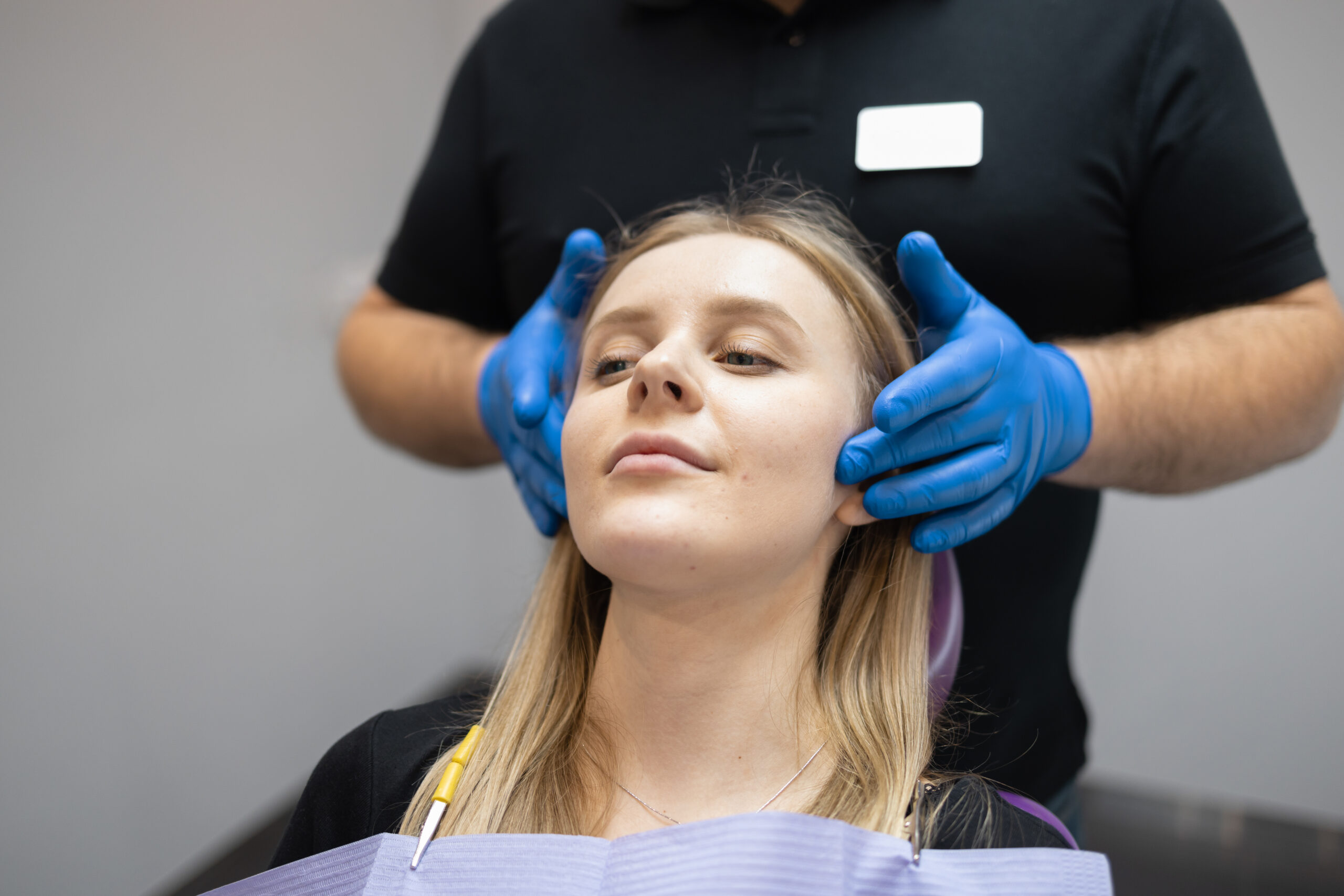 A woman patient getting ready for her oral surgery procedure